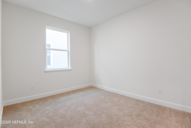 spare room with carpet flooring