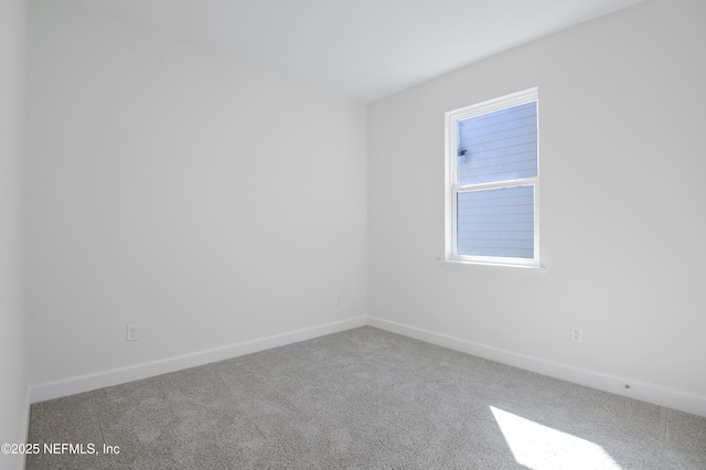 unfurnished room with carpet floors