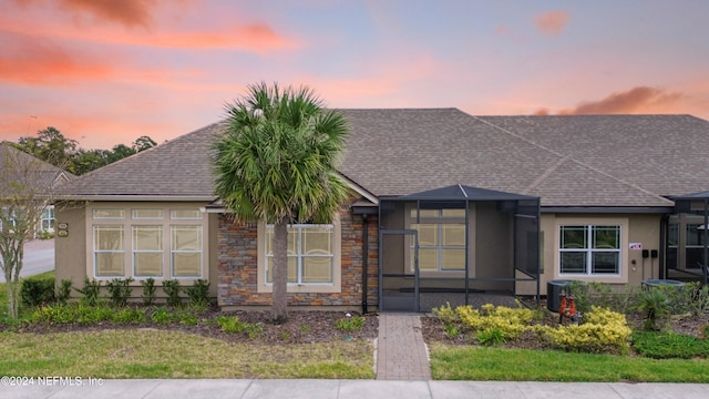 view of front of property featuring a lanai