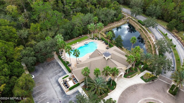 birds eye view of property featuring a water view