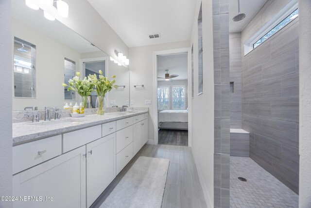 94 Hickory Pine Dr, Saint Augustine, FL 32092 - ensuite bathroom featuring double vanity, walk in shower, and plenty of natural light