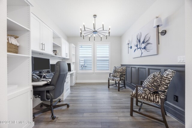 94 Hickory Pine Dr, Saint Augustine, FL 32092 - office area with a chandelier, wood finished floors, and baseboards
