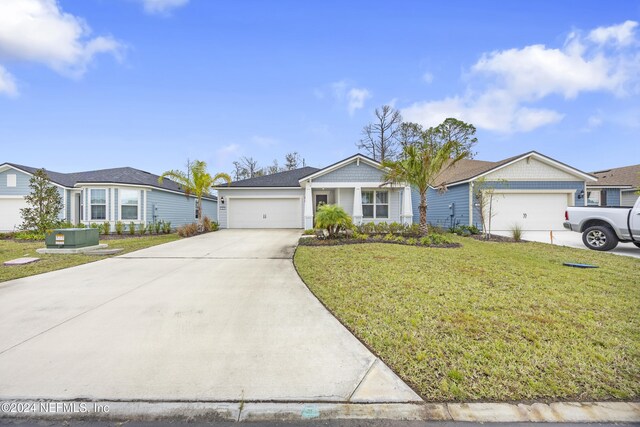 94 Hickory Pine Dr, Saint Augustine, FL 32092 - single story home with a garage, concrete driveway, and a front yard