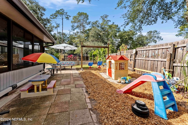 view of play area with a patio area