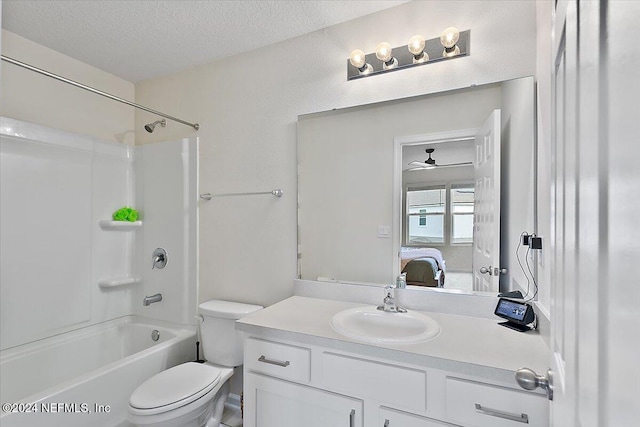 full bathroom with bathtub / shower combination, vanity, a textured ceiling, ceiling fan, and toilet