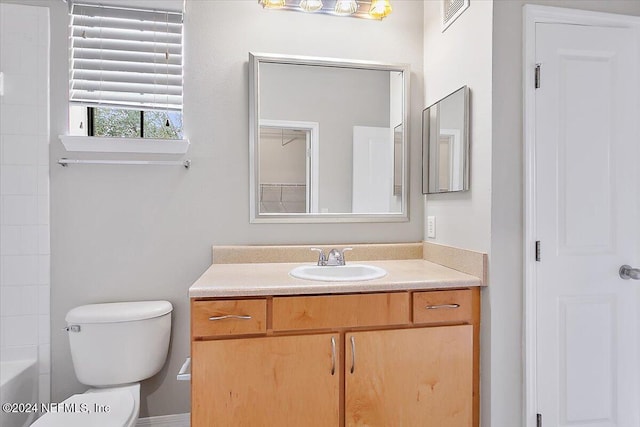 full bathroom featuring vanity, toilet, and shower / washtub combination