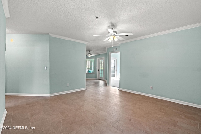 spare room featuring a textured ceiling, ceiling fan, and ornamental molding