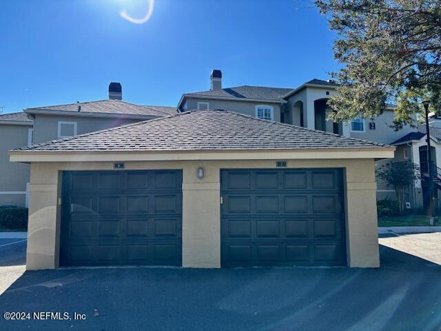 exterior space with a garage