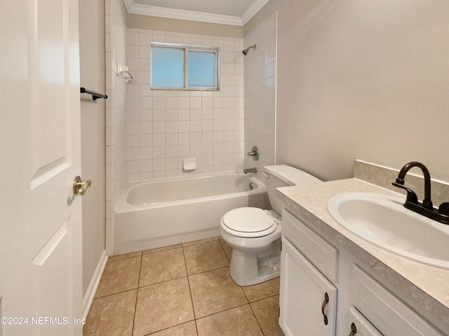 full bathroom with tile patterned flooring, crown molding, toilet, vanity, and tiled shower / bath