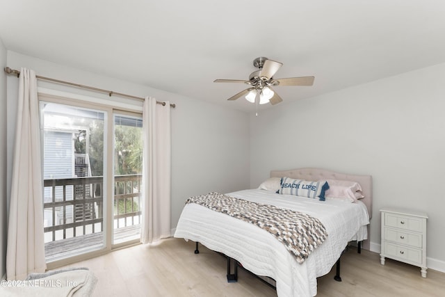 410 1st St S Unit C, Jacksonville Beach, FL 32250 - bedroom featuring access to exterior, wood finished floors, baseboards, and a ceiling fan