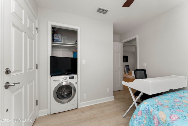 bedroom with washer / clothes dryer, ceiling fan, a closet, and light hardwood / wood-style floors