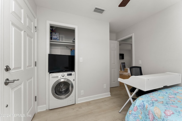 410 1st St S Unit C, Jacksonville Beach, FL 32250 - bedroom featuring washer / dryer, light wood finished floors, an office area, baseboards, and ceiling fan