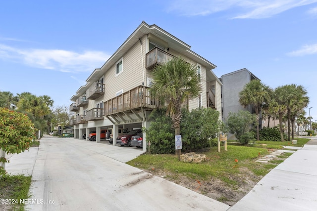 410 1st St S Unit C, Jacksonville Beach, FL 32250 - view of property with covered parking