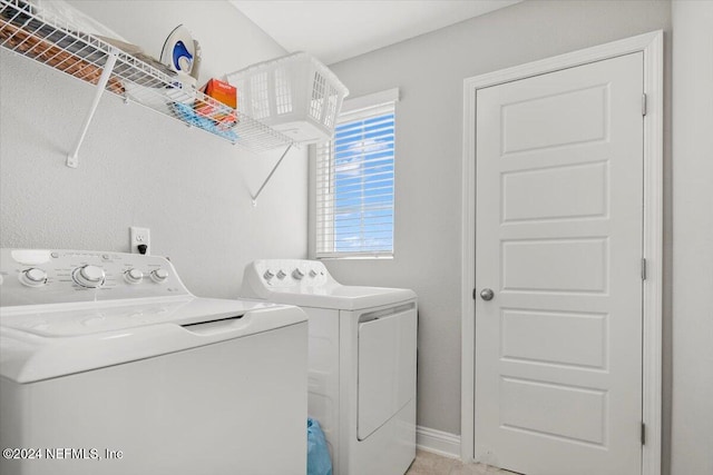 laundry area with washer and clothes dryer