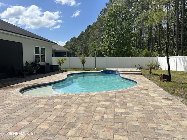 view of pool with a fenced in pool, a patio area, and a fenced backyard