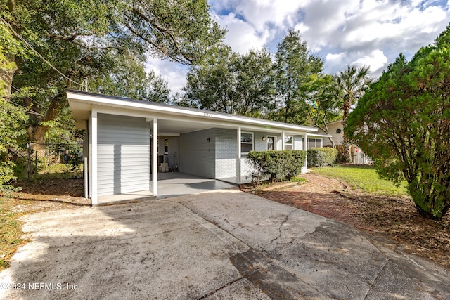 view of front of house with a carport