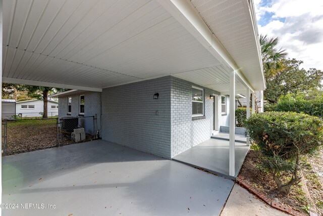 view of patio featuring a carport