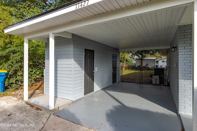 view of patio / terrace featuring a carport