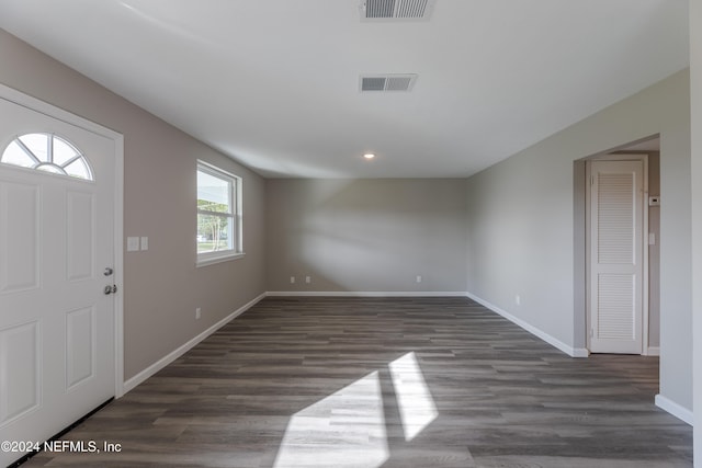 entrance foyer featuring dark hardwood / wood-style floors