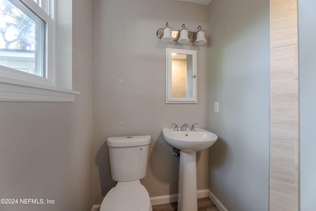 bathroom with sink and toilet