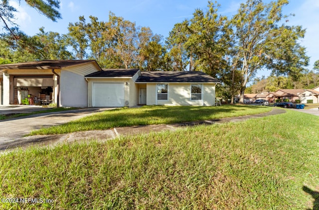 single story home featuring a front yard and a garage