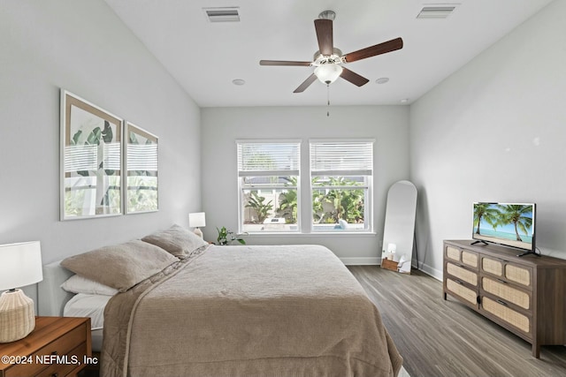 bedroom featuring hardwood / wood-style flooring and ceiling fan