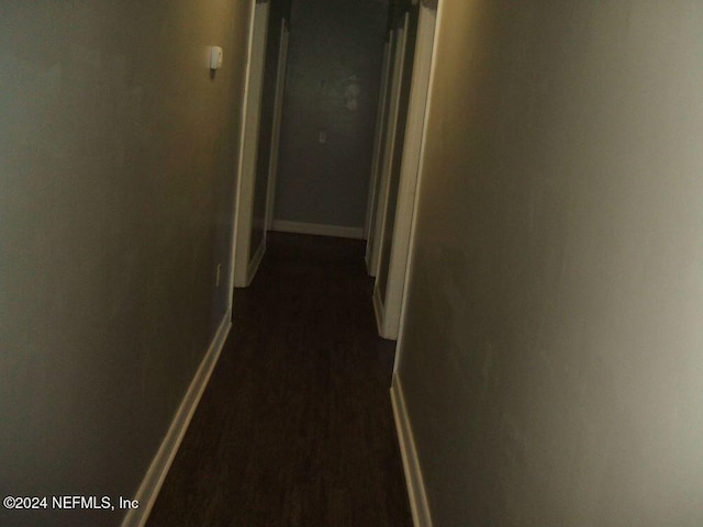 1113 Fieldcrest Rd, Jasper, FL 32052 - hallway featuring dark wood-type flooring and baseboards