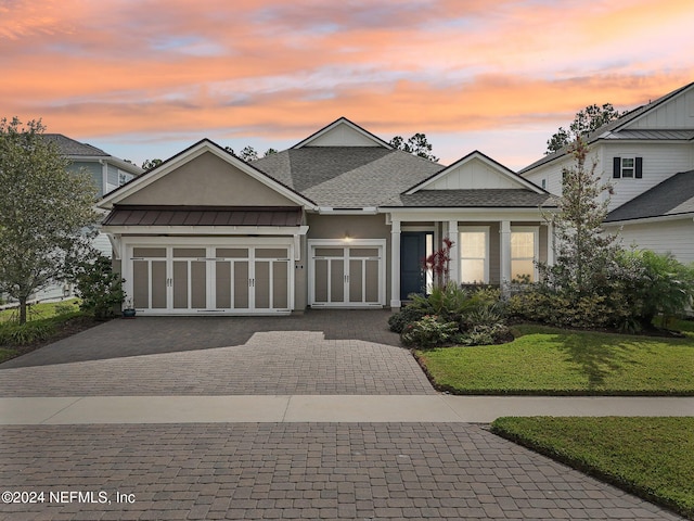 view of front of home featuring a yard