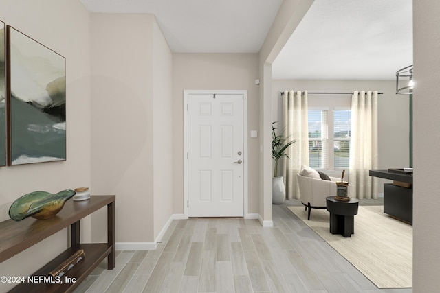 foyer with light hardwood / wood-style flooring