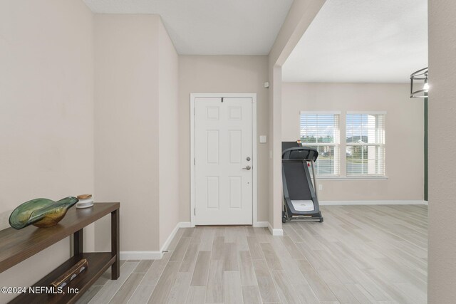 entryway with light wood-type flooring