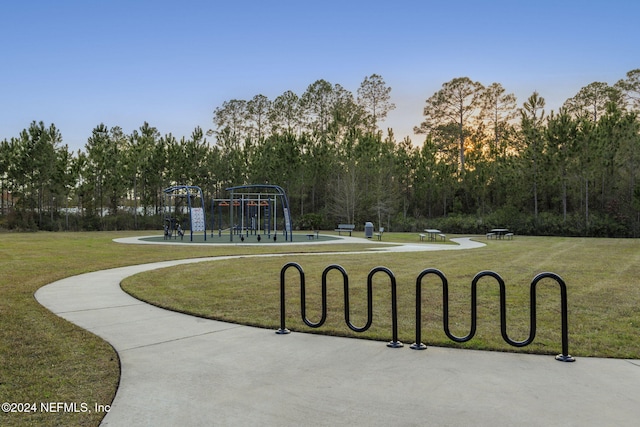 view of community featuring a yard and a playground