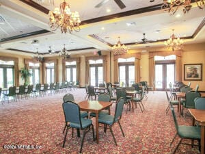 dining space featuring french doors, a wealth of natural light, ornamental molding, and ceiling fan