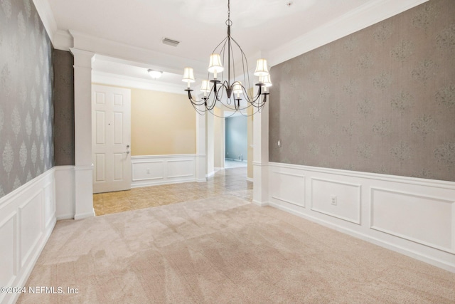 unfurnished dining area with a notable chandelier, ornamental molding, and light carpet