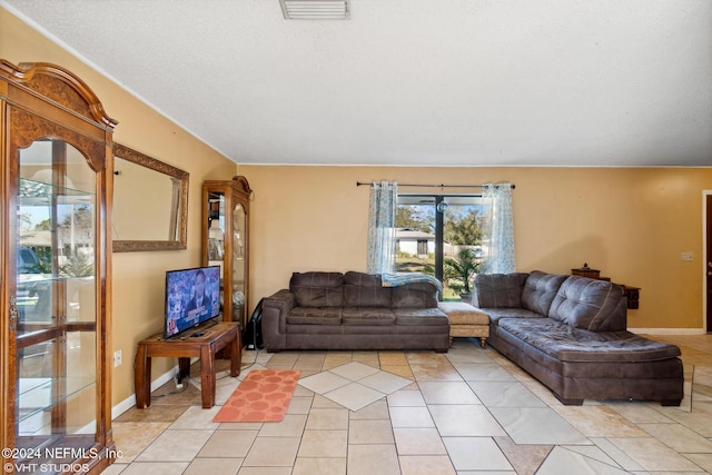 living room featuring a textured ceiling