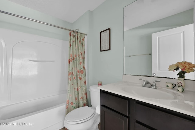 full bathroom featuring toilet, vanity, and shower / tub combo with curtain