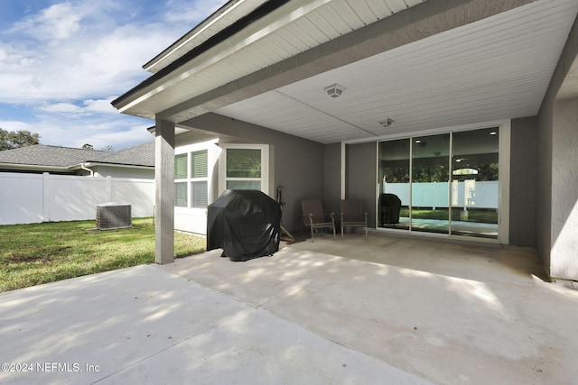 view of patio featuring central AC unit and area for grilling