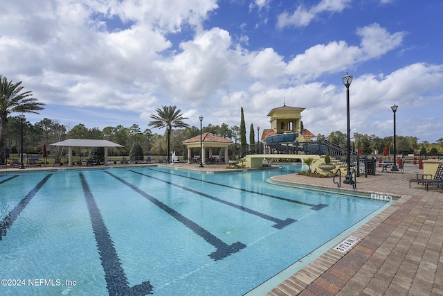 view of pool featuring a patio area