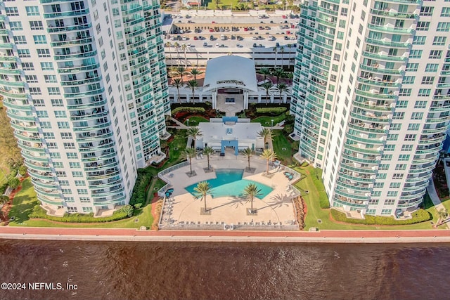 231 Riverside Dr Unit 1203-1, Daytona Beach, FL 32117 - bird's eye view of a pool area and apartment complex