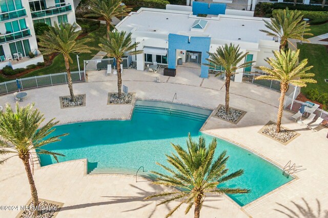 231 Riverside Dr Unit 1203-1, Daytona Beach, FL 32117 - community pool featuring a patio area