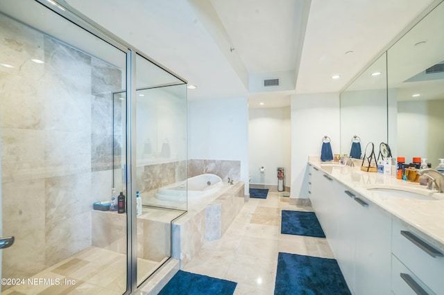 231 Riverside Dr Unit 1203-1, Daytona Beach, FL 32117 - full bath featuring a garden tub, double vanity, a shower stall, recessed lighting, and tile patterned floors