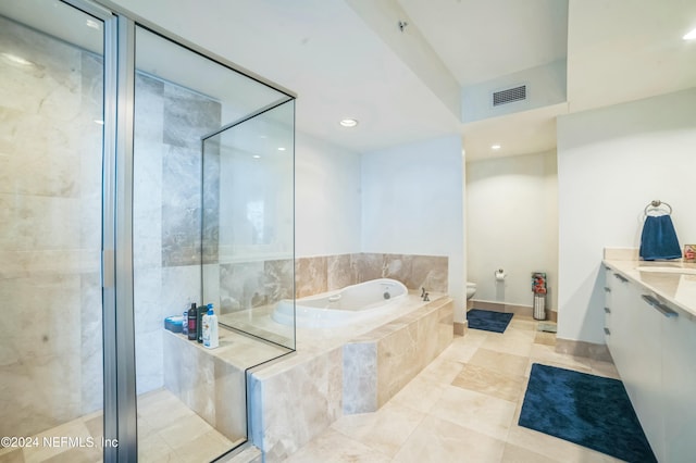 231 Riverside Dr Unit 1203-1, Daytona Beach, FL 32117 - full bathroom with vanity, a garden tub, a stall shower, and recessed lighting