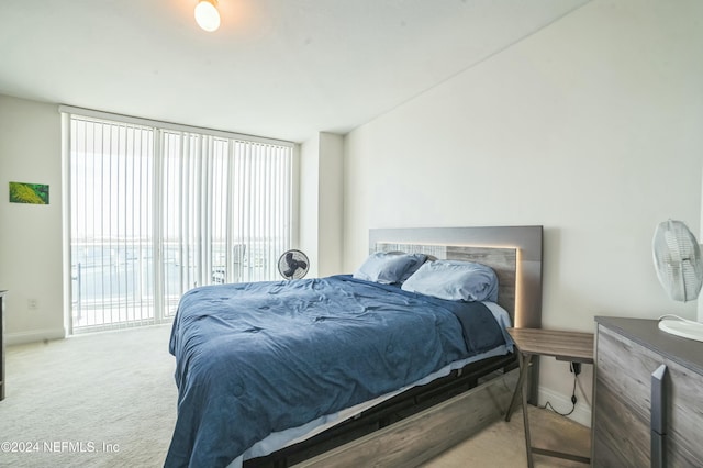 231 Riverside Dr Unit 1203-1, Daytona Beach, FL 32117 - carpeted bedroom with baseboards