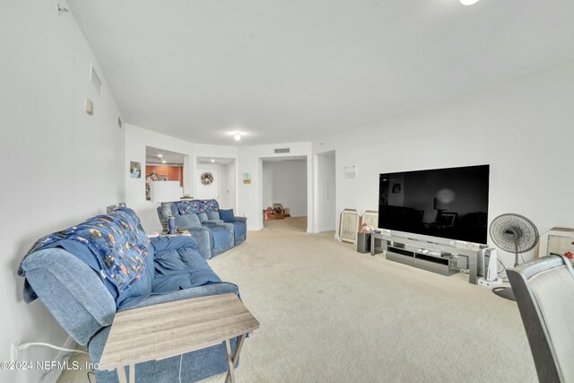 231 Riverside Dr Unit 1203-1, Daytona Beach, FL 32117 - living area featuring carpet flooring