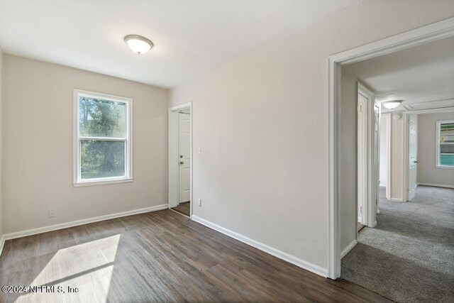 928 Brandywine St, Jacksonville, FL 32208 - empty room featuring baseboards and wood finished floors