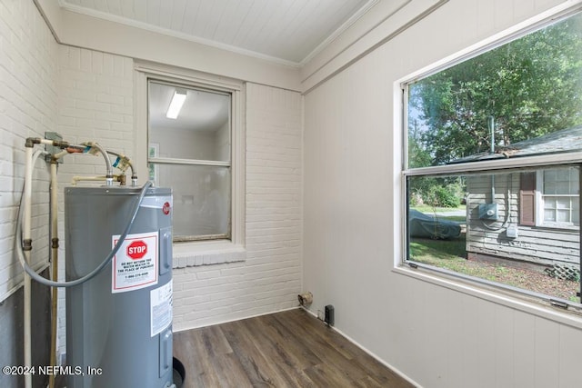 utility room featuring electric water heater