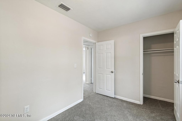 928 Brandywine St, Jacksonville, FL 32208 - unfurnished bedroom featuring carpet floors, baseboards, and a closet