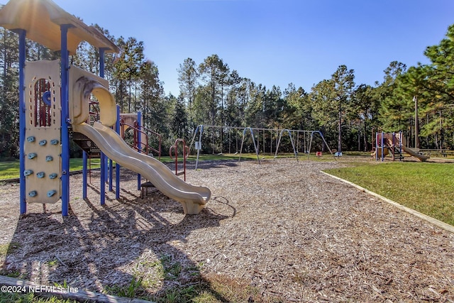 view of playground with a yard