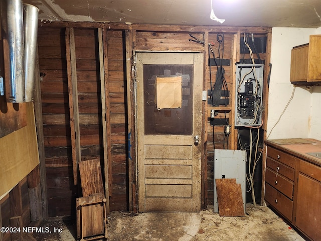 interior space featuring concrete flooring and electric panel