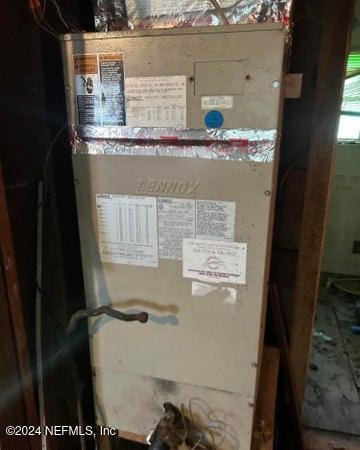 utility room with heating unit