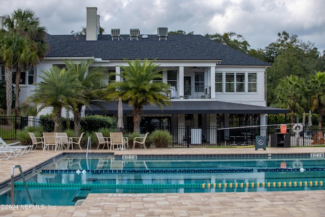 view of swimming pool featuring a patio